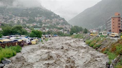 Heavy Rains In HP S Dharamshala Cars Buildings Swept Away In Terrible