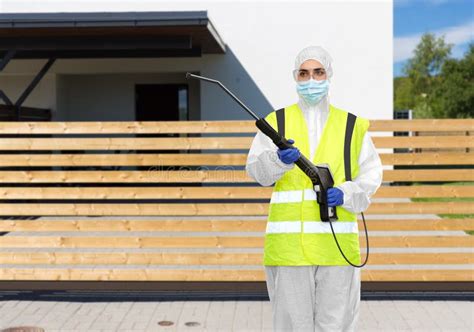 Sanitation Worker In Hazmat With Pressure Washer Stock Photo Image Of