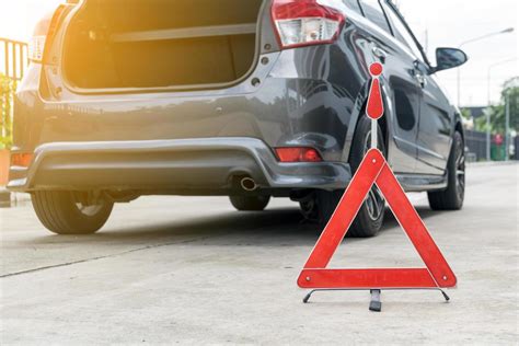 Broken car sign on a road with a broken down car 11973438 Stock Photo ...