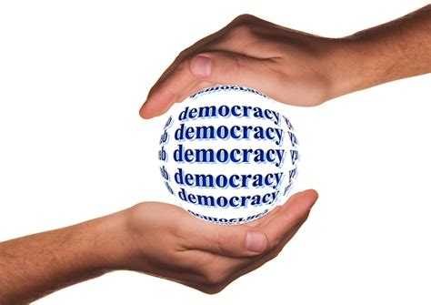 democracy text on hand logo free image | Peakpx
