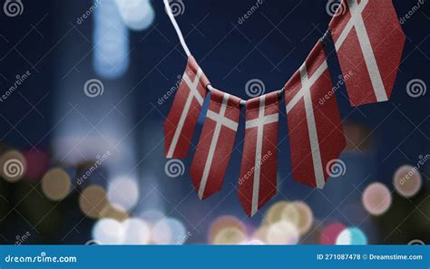 A Garland Of Denmark National Flags On An Abstract Blurred Background