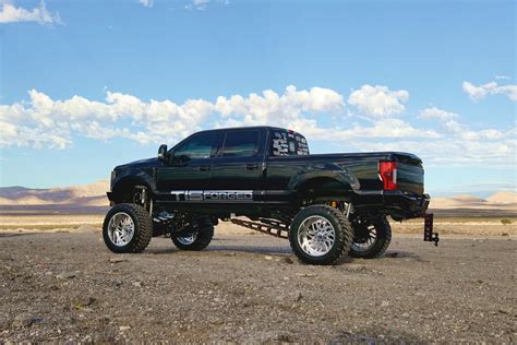 Dark Green F 350 Shows Off Custom Body Lift And Off Road Parts Carid