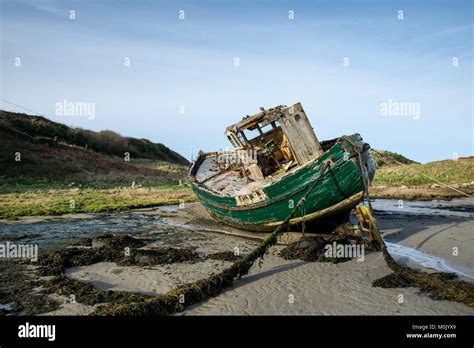 Old Wrecked Fishing Boat On The Donegal Coast In Ireland Stock Photo