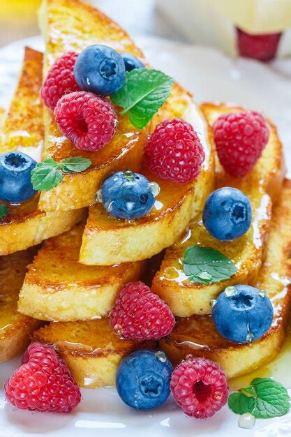 Premium Photo French Toast With Honey And Fresh Berries