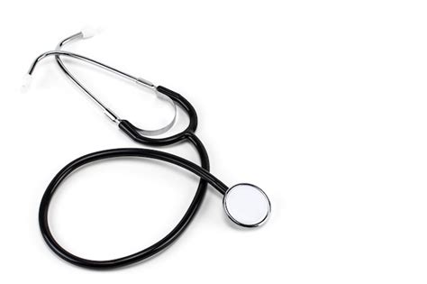 Doctor with white coat and stethoscope | Free Photo