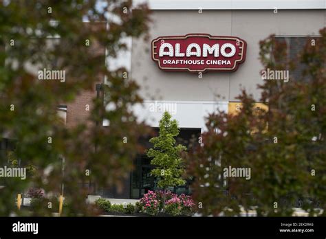 A logo sign outside of a The Alamo Drafthouse Cinema movie theater ...