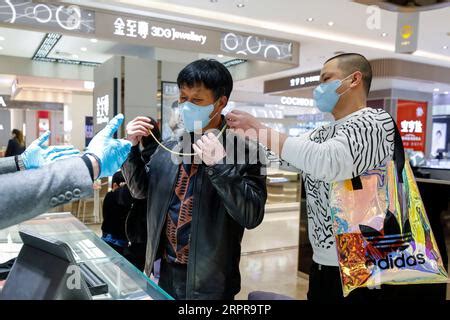 Wuhan March A Staff Member Takes A Customer S