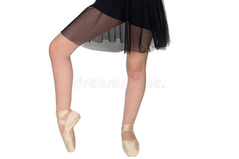 Ballerina Legs In Pointe Shoes Closeup On White Background Classic And