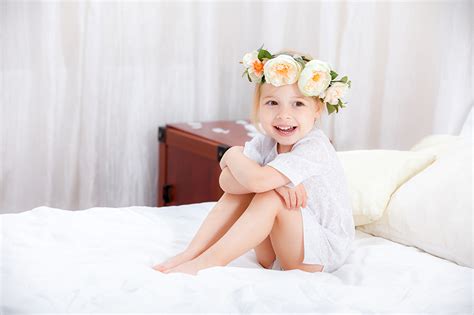 Cute Smiling Little Girl Sitting