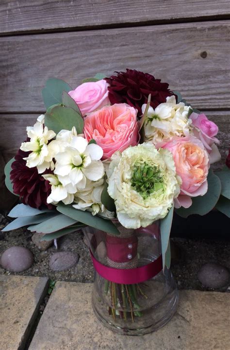 Jam Jars Wedding Flowers Autumnal Colours Sliced Log Table Flowers