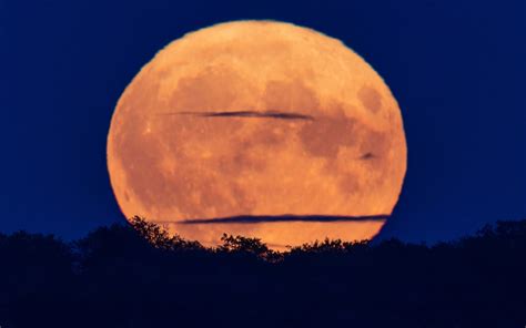 Global Views Of The Sturgeon Moon Considered A Supermoon And The