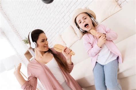 320 Mother And Daughters Singing Karaoke Stock Photos Pictures