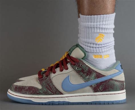 Crenshaw Skate Club X Nike SB Dunk Low FN4193 100 SBD