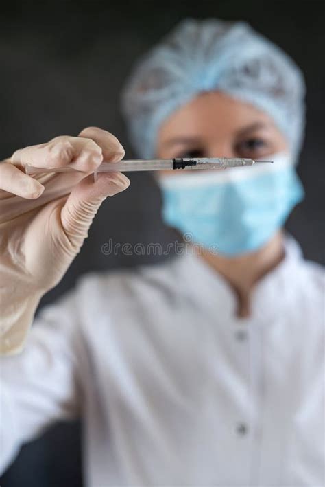 Female Doctor In Uniform Holding Syringe Isolated Stock Image Image