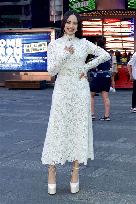 Sofia Carson Looks Amazing In A White Lace Dress While Posing In Front