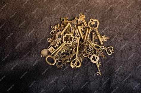 Premium Photo Retro Style Metal Keys On A Black Background