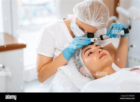 Skilled Female Dermatologist Doing The Skin Examination Stock Photo Alamy