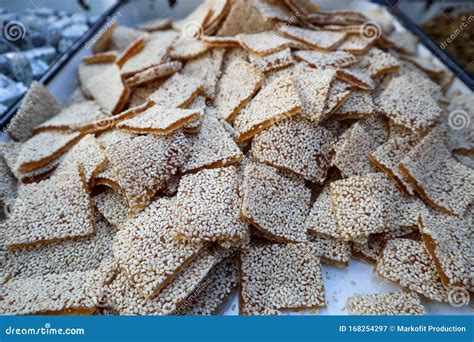 Chinese White Rice Cookies With White Sesame Seeds As Street Snack