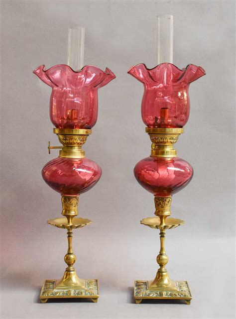 Lot 167 A Pair Of Victorian Cranberry Glass And