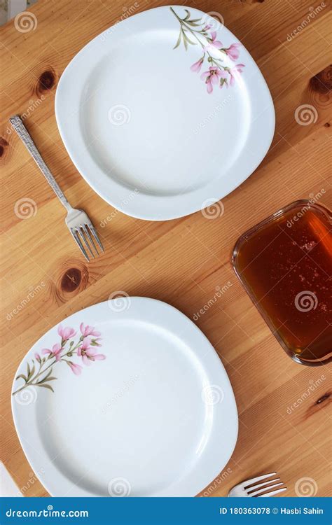 Top View Of Service For Breakfast On Table With Empty Plates Stock