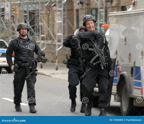 Police SWAT members editorial stock photo. Image of machine - 11892003