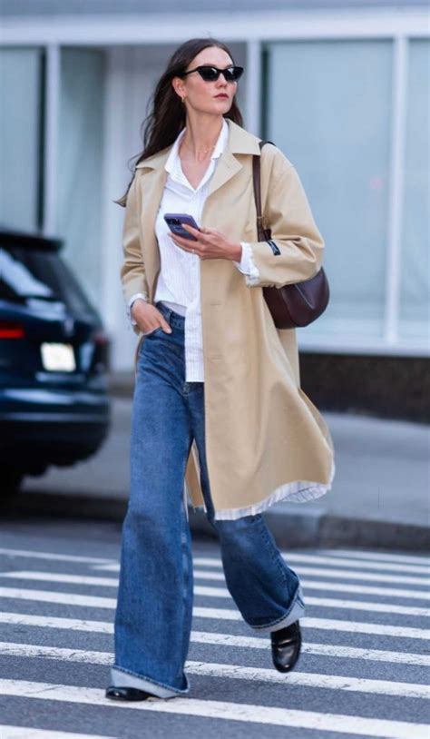 Karlie Kloss In A Beige Trench Coat Strolls On The Upper East Side In