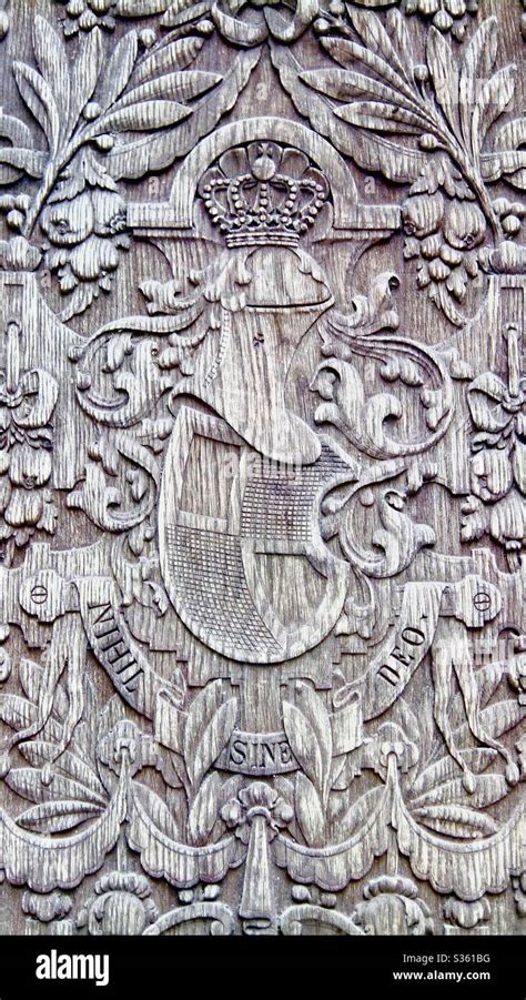 🇷🇴 Sinaia, Romania: Peleș Castle wooden door engraving latin Nihil Sine ...