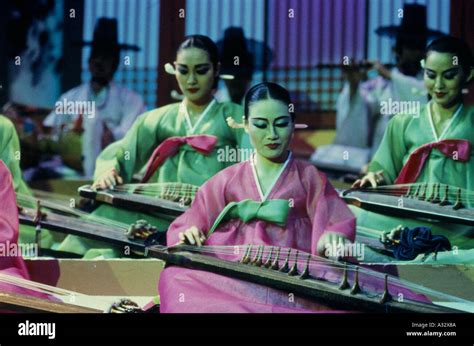 Women Playing Stringed Instruments In Traditional Korean Show Stock