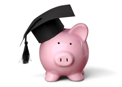 Premium Photo Piggy Bank With Black Graduation Hat