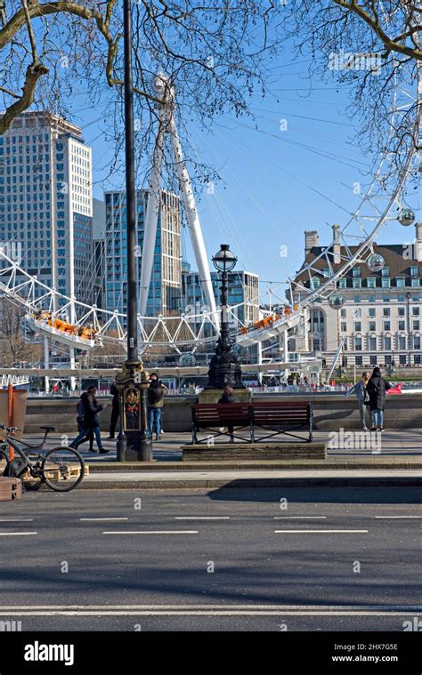 The London Eye Or Millenium Wheel Viewed From The Thames Embankment