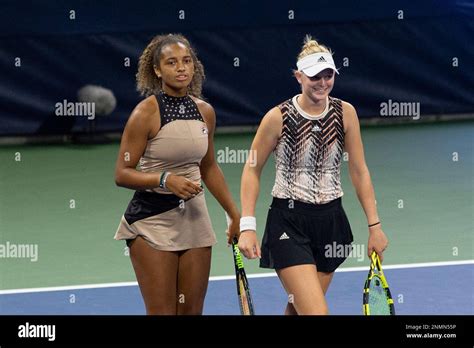 Ashlyn Krueger and Robin Montgomery react during a Junior Girls' Doubles semifinal match at the ...