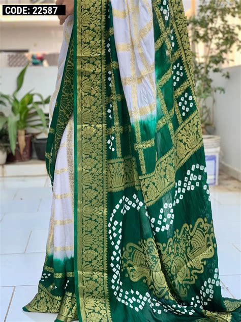 White And Green Color Bandhej Silk Saree With Zari Weaving Work