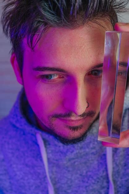 Premium Photo Close Up Of Man Holding Glass Slab