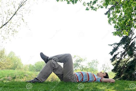 Man Lying On The Grass Stock Image Image Of Green Relaxation 2360621