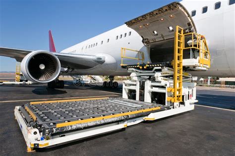 Loading cargo plane stock image. Image of load, ship - 18399417