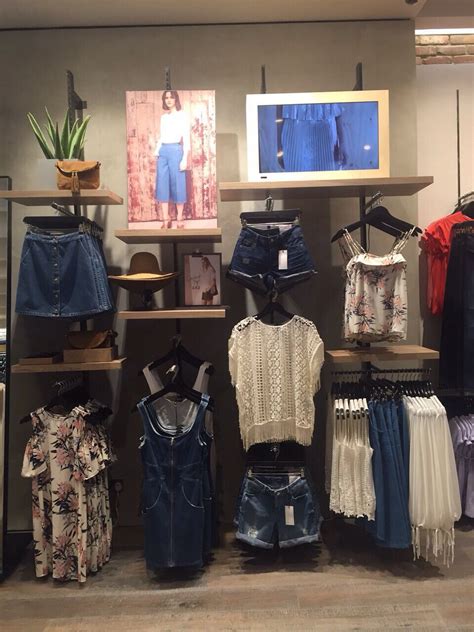 Denim And White Visual Merchandising Fashion Clothing Store Design