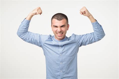 Premium Photo Portrait Of Very Excited Young Hispanic Man Celebrating