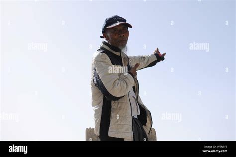 Chinese Farmer And Amateur Astronomer Wu Shiying Shows His Telescope At