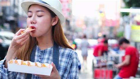 Asian Young Woman Eating Traditional Asian Street Food Food Stock Footage Ft Asia And Bangkok