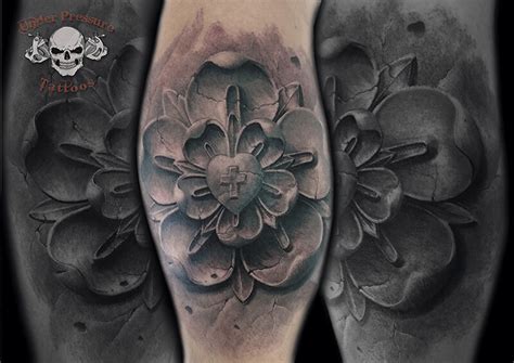 Black And Grey Under Pressure Tattoos