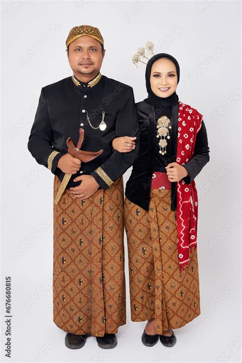 Full Length Portrait Of Smiling Happy Couple Husband And Wife Wearing