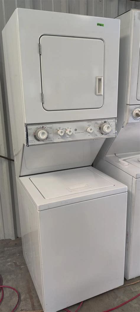 GE 24"W stackable top load washer and electric dryer delivery fee depends on add for sale in ...