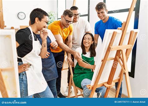 Group Of People Smiling Happy And Looking Draw Of Partner At Art Studio