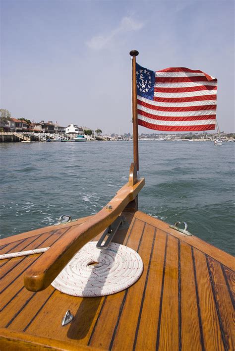 American Flag On The Bow Of Boat Photograph By James Forte