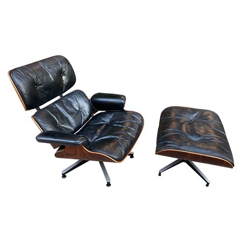 Herman Miller Walnut Lounge And Ottoman By Charles And Ray Eames At