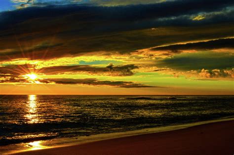 Nauset Light Beach Sunrise Through The Clouds Photograph By Dianne