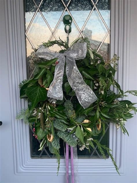 How To Hang A Wreath On Your Front Door 7 No Damage Methods