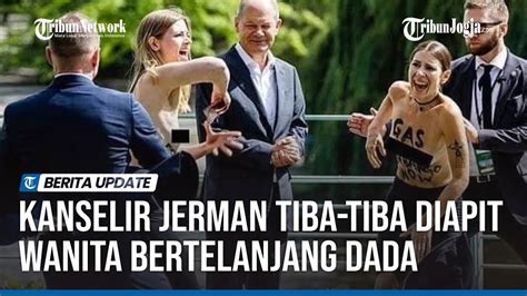 Kanselir Jerman Tiba Tiba Diapit Wanita Bertelanjang Dada Yang Serukan