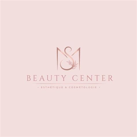 The Logo For Beauty Center With A Pink Background And Gold Letters On