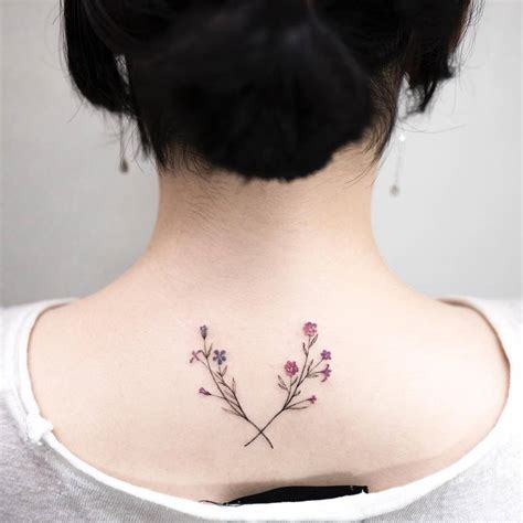 Flower Wreath Tattoo On The Upper Back